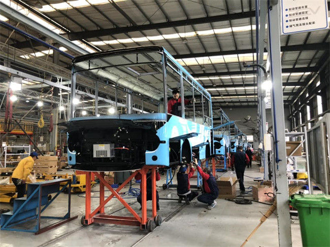 7m Uzunlukta, 200km Sürüş Mesafeli, Toplu Taşıma İçin Sol Direksiyonlu Elektrikli Mini Otobüs